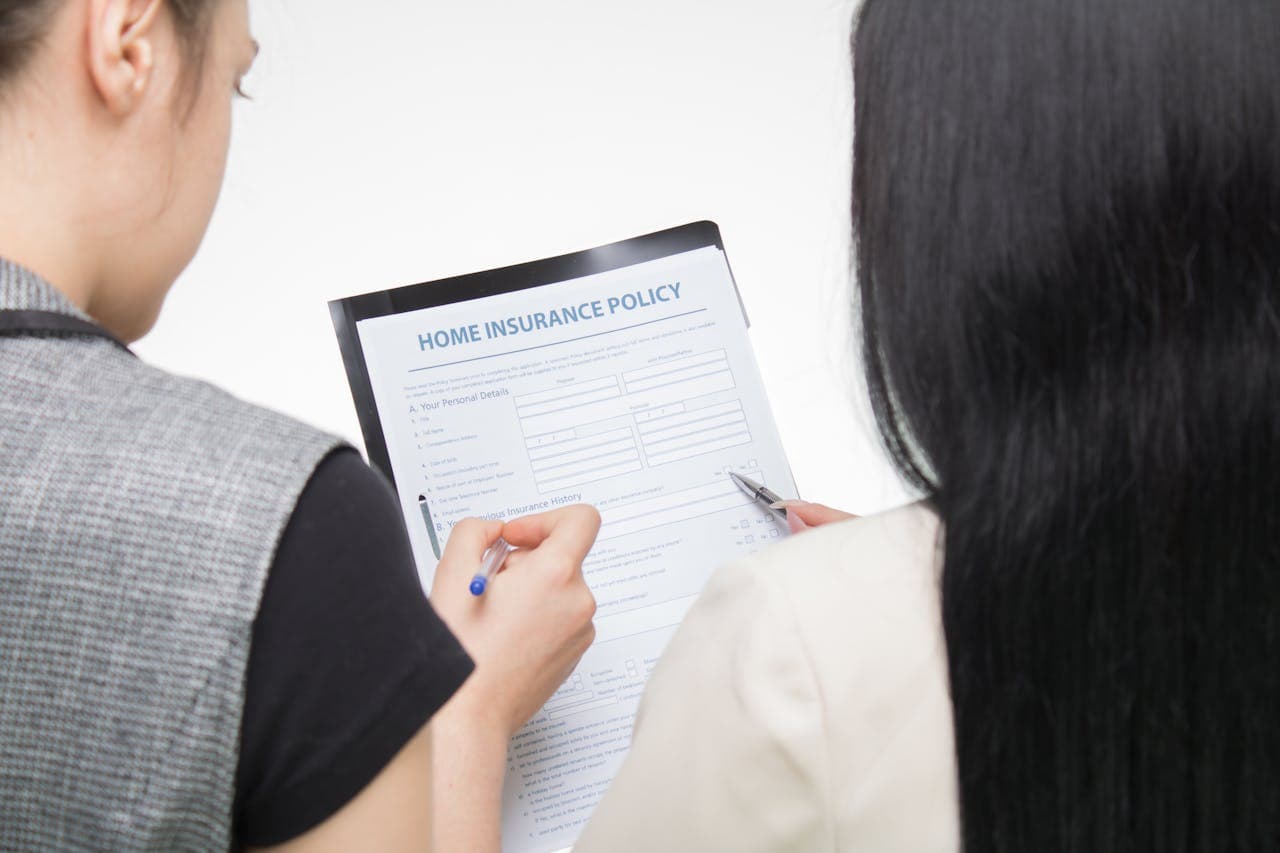 People looking at an insurance policy